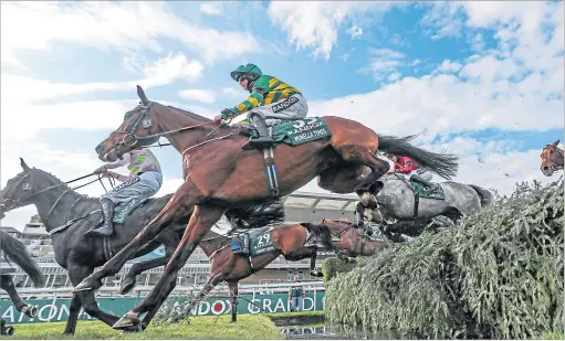  ??  ?? Minella Times ridden by Rachael Blackmore clears the water during the Grand National at Aintree yesterday
Picture:
David Davies/pa