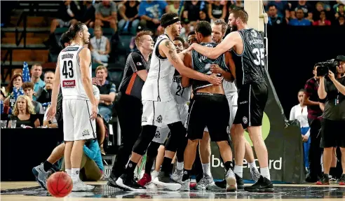  ?? PHOTO: GETTY IMAGES ?? New Zealand Breakers and Melbourne United players engage in a skirmish during the NBL match in Auckland yesterday.