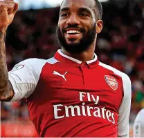  ??  ?? New love: Lacazette scored on his home debut