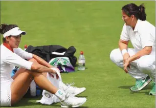  ??  ?? Conchita Martinez (right) with Muguruza at last year's Wimbledon