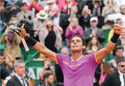  ??  ?? MONACO: Spain’s Rafael Nadal celebrates after winning against Britain’s Kyle Edmund during the Monte Carlo ATP Masters Series tournament tennis match yesterday in Monaco. — AFP