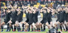 ??  ?? The All Blacks perform a haka, a Maori dance before each match.
Youngest All Black — Jonah Lomu at 19 years, 45 days.
Oldest All Black — Ned Hughes at 40 years, 123 days.
Heaviest All Black — Neemia Tialata at a huge 136kg!
Lightest All Black — Merv Corner at 58.9kg.
Tallest All Black — Dominic Bird at 2.06m, which is just slightly over 6ft 9in.