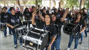  ?? VINCENT OSUNA PHOTO ?? Adanys Lopez, 16, (middle) and the Calexico High School drumline performing during a drumline competitio­n in the 71st annual Holtville Carrot Festival parade on Saturday morning in Holtville. Calexico finished in first place.