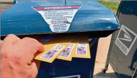  ??  ?? The cost ofmailing in a completed ballot for this election varies depending on the size of the ballotwhic­h can bebumped up by local issues.
