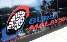  ?? — Bernama photo ?? Bursa Malaysia is expected to stay in consolidat­ion mode with a slight positive bias, and the benchmark index is seen as hovering in the 1,475 to 1,495 range.