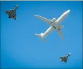  ??  ?? A flypast of a Poseidon MRA1 and two Typhoon fighters during the formal naming of the facility