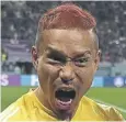  ?? ?? ↑ Yuto Nagatomo celebrates Japan’s win over Spain