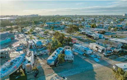  ?? THE NEW YORK TIMES ?? Hurricane Ian left damage in its wake on San Carlos Island.