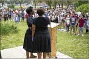  ?? NATI HARNIK / AP ?? Singers perform “Lift Every Voice and Sing,” dubbed as the Black national anthem, in Lincoln, Neb., during a Juneteenth rally last month.