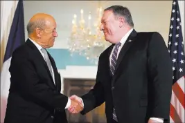  ?? Cliff Owen ?? The Associated Press Secretary of State Mike Pompeo, who met with French Foreign Minister Jean-yves Le Drian at the State Department on Thursday, departed Washington on Friday for a tour of East Asia that will take him to Japan, North and South Korea, and China.