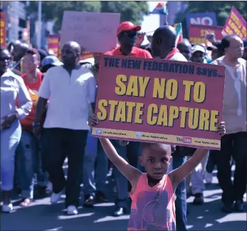  ??  ?? South Africans of all ages marched to Union Buildinga in March to call for President Jacob Zuma to resign after his shock cabinet reshuffle.