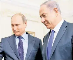  ??  ?? Critical relationsh­ip: Pres. Putin (l.) with PM Netanyahu in 2015.