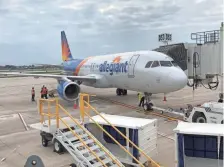  ?? PHOTO COURTESY MICHELLE WHALEY/ALLEGIANT ?? An Allegiant jet is parked at a gate Friday at Milwaukee's Mitchell Internatio­nal Airport.