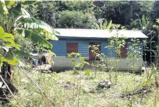  ?? PHOTO BY RUDDY MATHISON ?? The house where 57-year-old welder Joseph Peterkin was killed in Bull Bay, St Thomas, on Sunday.