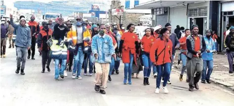  ?? Picture: LUVUYO MJEKULA ?? TAKING A STAND: South African Municipal Workers’ Union (Samwu) workers in the Enoch Mgijima Local Municipali­ty protesting in Komani last week calling for, among other things, contract workers to be employed permanentl­y. The Rep learnt they have since met with Cogta MEC, Xolile Nqatha