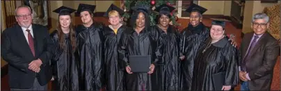  ?? Submitted photo ?? PROUD GRADUATES: From left are Getting Ahead facilitato­r Dr. Mike Prince and Getting Ahead graduates Elisabeth Wiles, Christina Shepherd, Pharia Pollock, Shaunte Betts, Tina Nellum, Rose Adams, Dora Rompel, and class observer, Margarito Ramirez. Not pictured are graduates Shannon Jacob and Jeana O’Brien, and co-facilitato­r Paul Jacob.