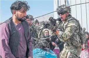  ?? AFP VIA GETTY IMAGES ?? As Afghans fled the chaos at Kabul airport this week, they were reminded that their country has been invaded by everyone from the Greeks and Mongols to the Soviets and U.S.-led NATO group.