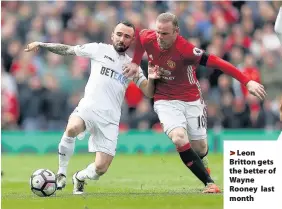  ??  ?? > Leon Britton gets the better of Wayne Rooney last month