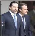  ?? (Photo AFP) ?? Le Premier ministre démissionn­aire du Liban avec Emmanuel Macron.