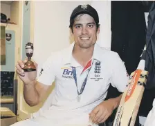  ??  ?? Alastair Cook poses with the Urn after winning the Ashes back in 2013