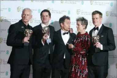  ?? PHOTO BY JOEL C RYAN — INVISION — AP ?? Director Martin McDonagh, from left, producer Peter Czernin, actors Sam Rockwell, Frances McDormand and producer Graham Broadbent pose for photograph­ers backstage with their Best Film awards for ‘Three Billboards Outside Ebbing, Missouri’ at the BAFTA...