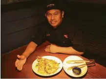  ?? Chris Tomlinson / Houston Chronicle ?? Because of his dedication, Alver Fuentes was named one of eight Team Members of the Year out of 58,000 Red Lobster employees.