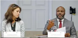  ?? STAFF PHOTO BY C.B. SCHMELTER ?? Tennessee Education Commission­er Penny Schwinn, left, listens as Superinten­dent Bryan Johnson speaks during a Partnershi­p Network Advisory Board meeting at the Hamilton County Department of Education board room Tuesday.