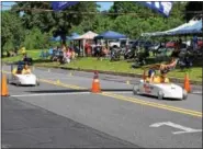  ?? MARIAN DENNIS – DIGITAL FIRST MEDIA ?? Racers start of the day Saturday as they complete the first race in the Pottstown Soap Box Derby Challenge race.