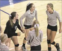  ?? Tommy Romanach / Rome News-Tribune ?? The Coosa volleyball team celebrates after a point during the Coosa Invitation­al at Shorter University on Saturday.