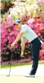  ?? AP PHOTO/CHARLIE RIEDEL ?? Rory McIlroy watches his putt on the 13th hole during a practice round for the 2019 Masters at Georgia’s Augusta National Golf Club. Because of the coronaviru­s pandemic, the Masters is being held in November for the first time.