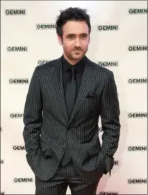  ?? BRETT GUNDLOCK ?? Allan Hawco poses on the red carpet at the 26th Gemini Awards in Toronto in September.