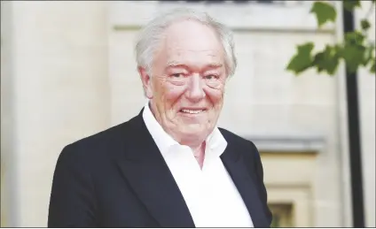  ?? AP PHOTO/JOEL RYAN ?? British actor Michael Gambon arrives in Trafalgar Square, in central London, for the world premiere of “Harry Potter and The Deathly Hallows: Part 2,” the last film in the series, on July 7, 2011.