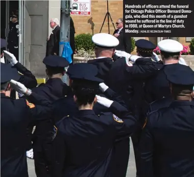  ?? | ASHLEE REZIN/ SUN- TIMES ?? Hundreds of officers attend the funeral for Chicago Police Officer Bernard Domagala, who died this month of a gunshot wound he suffered in the line of duty in 1988, at Queen of Martyrs Church, Monday.