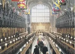  ?? PHOTO: GETTY ?? Prince Philip’s coffin is carried into St George’s Chapel.