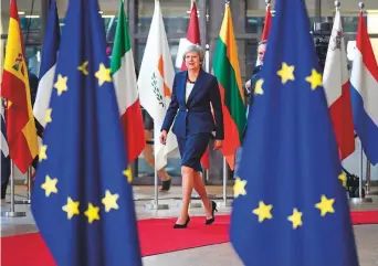  ?? AFP ?? ■ May arrives at the European Council in Brussels. She said yesterday the UK and the European Union could overcome their ‘few but considerab­le’ disagreeme­nts.