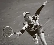  ?? Anne-Christine Poujoulat / Getty Images ?? Nineteen-year-old Jannik Sinner dives for the return in a victory over Alexander Zverev on Sunday.