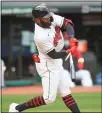  ?? TIM PHILLIS — FOR THE NEWS-HERALD ?? Amed Rosario swings April 5 during the home opener against the Royals.