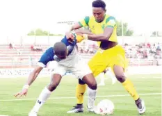  ??  ?? Anthony Agbaji (L) of Lobi Stars fights for the ball with Kabiru Umar of Plateau United during their league match at the Aper Aku Stadium in Makurdi last season. Lobi drew 0-0 with Rivers United last Sunday in Port-Harcourt