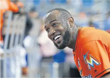  ?? WILFREDO LEE/AP ?? Miami’s Marcell Ozuna is fourth in the National League in hitting at .333 and has 17 home runs and 47 RBI. He is fourth in the league inWAR as well.