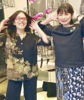  ?? ?? Cecile Licad and author Millet Mananquil goofing for a photo after a press lunch at Peninsula Manila in 2017, by doing Licad’s habitual manner of scratching her head with both hands to express frustratio­n.
