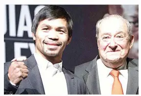  ??  ?? Pacquiao at Arum