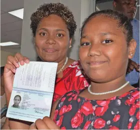  ?? Photo: Ronald Kumar ?? Salailagi Kolinisau with her mother Mere Kolinisau after Salailagi received her ePassport in Suva on September 19, 2019.