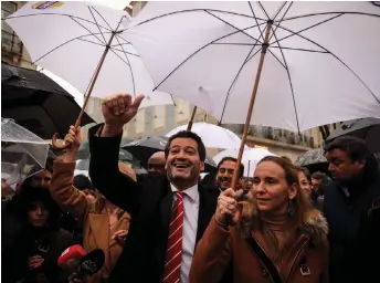  ?? — AFP photo ?? Ventura gives a thumbs-up as he takes part in a street rally in Lisbon.