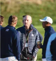  ??  ?? 2018 Ryder Cup US team captain Jim Furyk (centre).