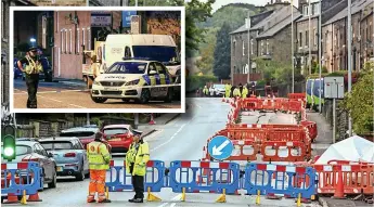  ?? Adam Vaughan ?? ●● Feathersta­ll Road closed off and (inset) police at the scene