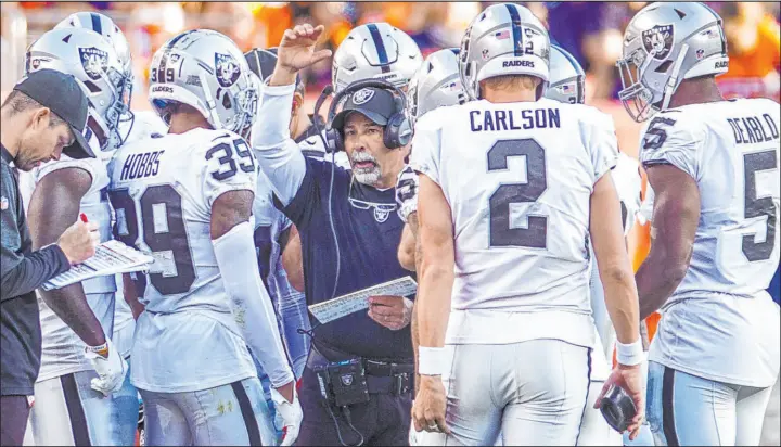  ?? L.E. Baskow Las Vegas Review-journal @Left_eye_images ?? In his first game leading the Raiders, interim coach Rich Bisaccia let the coordinato­rs run their units and benefited from the team’s most complete performanc­e this season.