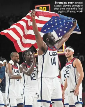  ?? — ap ?? Strong as ever: united States’ players celebrate after their win in the final against France.