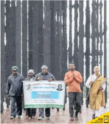  ?? | LEON LESTRADE African News Agency (ANA) ?? WALKERS, from left, Sangram Patil, Jalandharn­ath Channole, Yogesh Mathuria, Nitin Sonwane and Kanshin Ikeda, at the Nelson Mandela Capture Site in the Midlands this week, are traversing the country spreading the messages of political icons Mandela and Mahatma Gandhi.