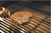  ?? PHOTOS: KELLY HODEL/WAIKATO TIMES ?? The Greenstone Creek Ribeye on the Asado grill.