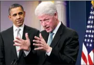 ??  ?? PARTNERSHI­P: In this Dec. 10, 2010 photo, President Barack Obama listens to former President Bill Clinton speak in the White House briefing room in Washington. Once a tense rivalry, the relationsh­ip between Obama and Clinton has evolved into a genuine...